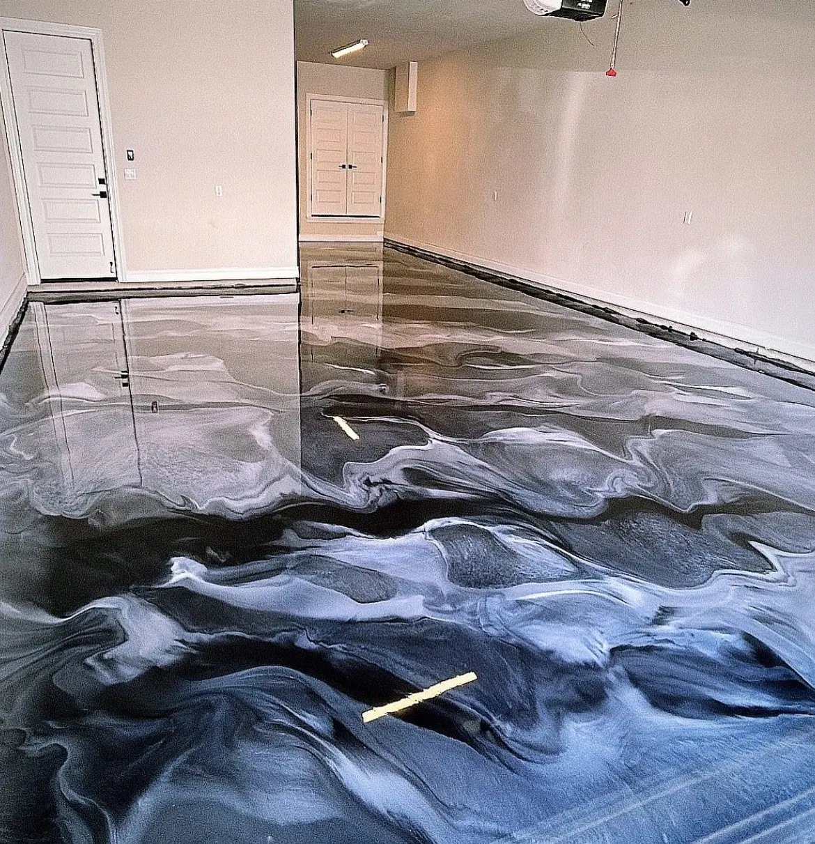 Blue and gray metallic epoxy garage floor